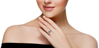 14K White Gold Genuine Swiss Blue Topaz And Diamond Solitaire Bypass Oval Ring 1 25 Carats Sizes 5 To 9 R63038 on a model