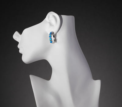 Sterling Silver Created Blue Opal Hoop Earrings 2 5 Carats Se9030 on a model