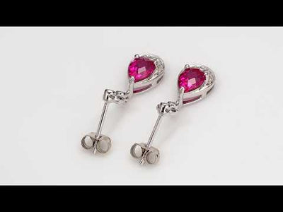 Video of Ruby Earrings Sterling Silver Pear Shape 1.5 Carats SE7148. Includes a Peora gift box. Free shipping, 30-day returns, authenticity guaranteed. 