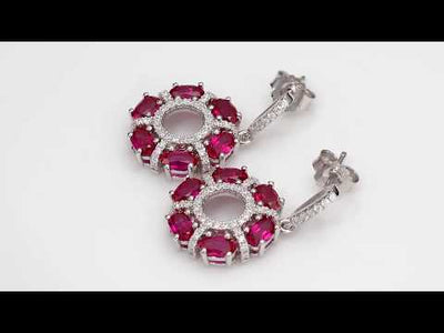 Video of Created Ruby Dahlia Drop Earrings Sterling Silver 3 Carats SE8574. Includes a Peora gift box. Free shipping, 30-day returns, authenticity guaranteed. 