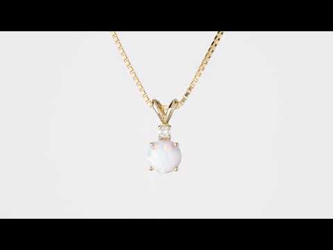 Video of Peora 14 Karat Yellow Gold Created Opal Diamond Solitaire Pendant P9856. Includes a Peora gift box. Free shipping, 30-day returns, authenticity guaranteed. 
