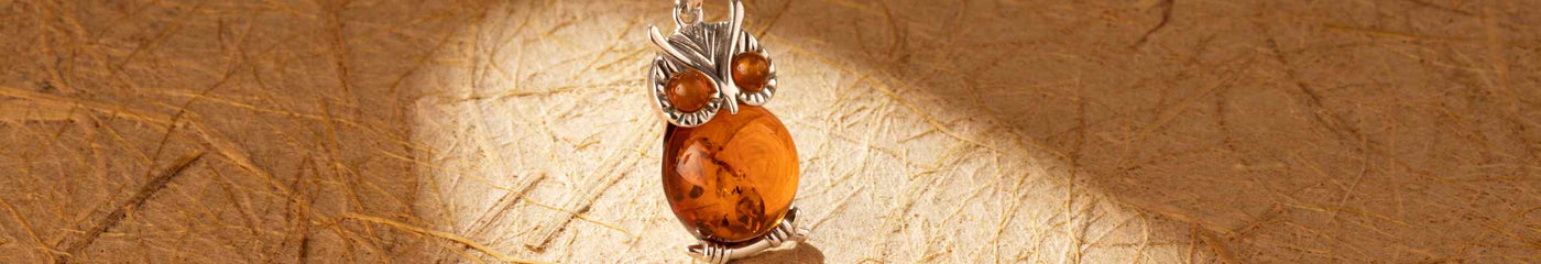 Amber animal jewelry in sterling silver