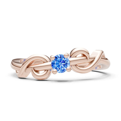 Double Knot Tiny Solitaire Andromeda Twist Ring - Round
