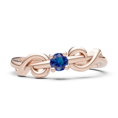 Double Knot Tiny Solitaire Andromeda Twist Ring - Round