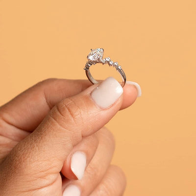 Moissanite Engagement Ring and Wedding Band Bridal Set Scattered Side Stones Sterling Silver 1.50 Carats Oval Shape
