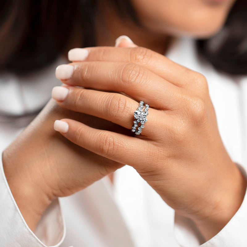 Moissanite Engagement Ring and Wedding Band Bridal Set Scattered Side Stones Sterling Silver 1.50 Carats Oval Shape