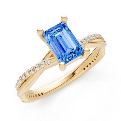 Swiss Blue Topaz Twisted Emerald Cut Engagement Ring
