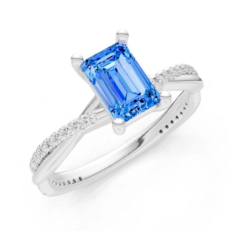 Swiss Blue Topaz Twisted Emerald Cut Engagement Ring