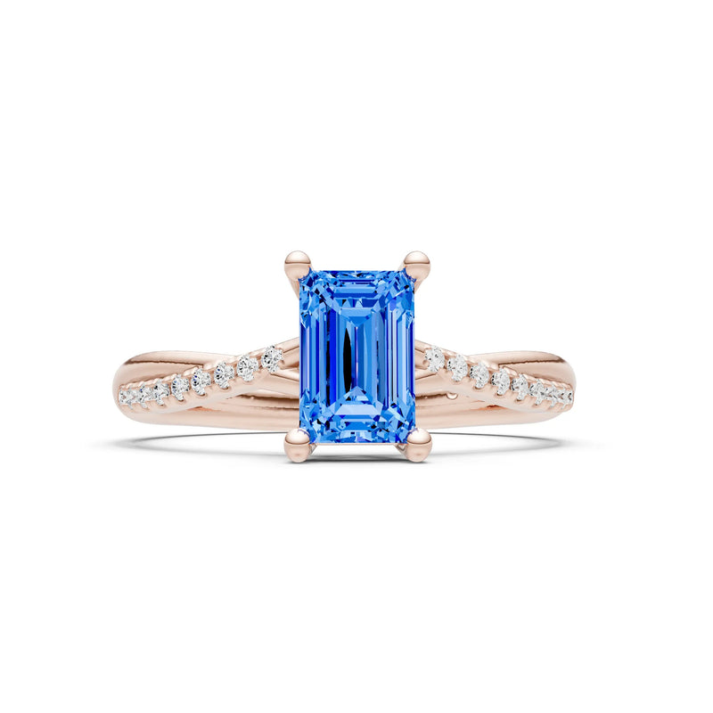 Swiss Blue Topaz Twisted Emerald Cut Engagement Ring