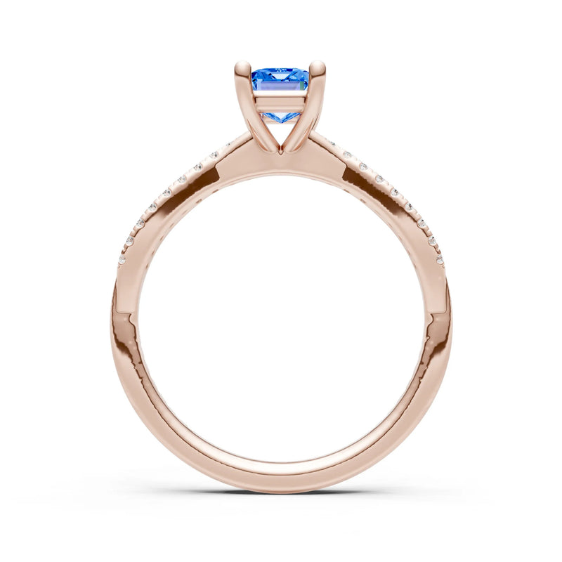Swiss Blue Topaz Twisted Emerald Cut Engagement Ring