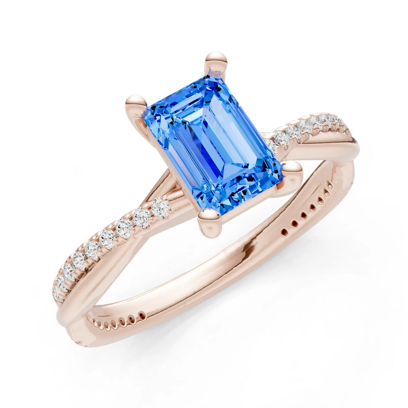 Swiss Blue Topaz Twisted Emerald Cut Engagement Ring