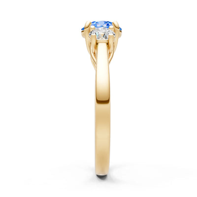 Swiss Blue Topaz Three Round Cut Stone Ring