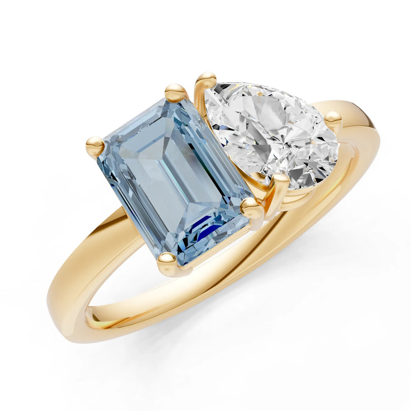 Aquamarine Emerald Cut Gemstone and Pear Cut Diamond Cocktail Ring