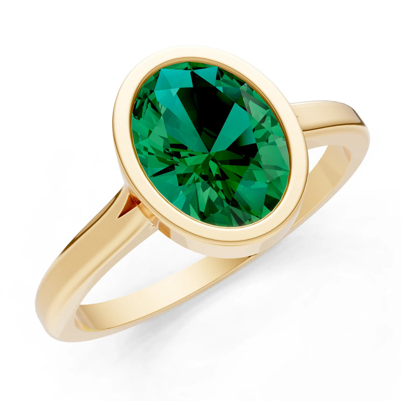 Emerald Oval Shape Bezel Set Solitaire Ring