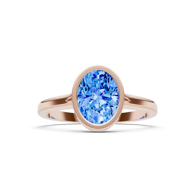 Swiss Blue Topaz Oval Shape Bezel Set Solitaire Ring