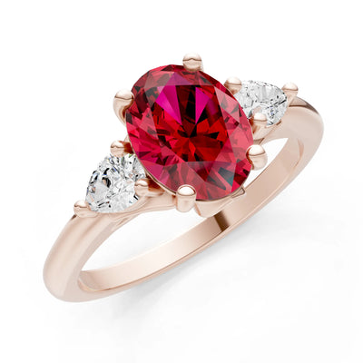 Trellis Three Stone Oval and Pear Gemstone Engagement Ring