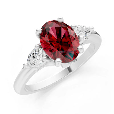 Trellis Three Stone Oval and Pear Gemstone Engagement Ring
