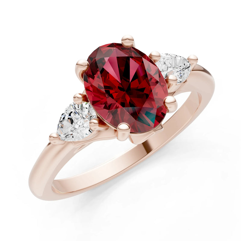 Trellis Three Stone Oval and Pear Gemstone Engagement Ring