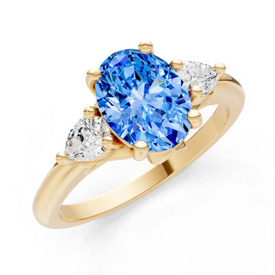 Trellis Three Stone Oval and Pear Gemstone Engagement Ring