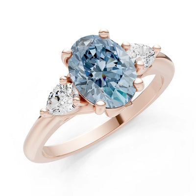 Trellis Three Stone Oval and Pear Gemstone Engagement Ring