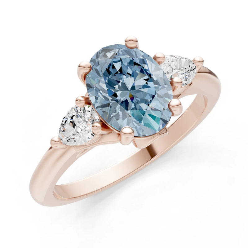 Trellis Three Stone Oval and Pear Gemstone Engagement Ring