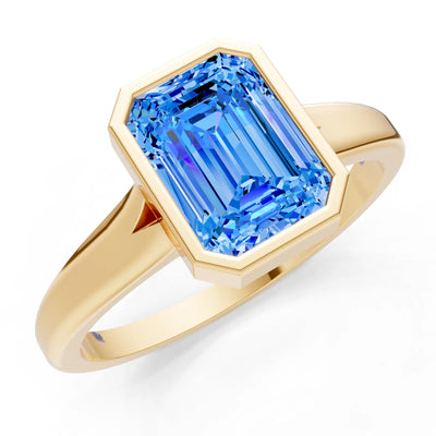 Swiss Blue Topaz Emerald Cut Bezel Set Solitaire Ring