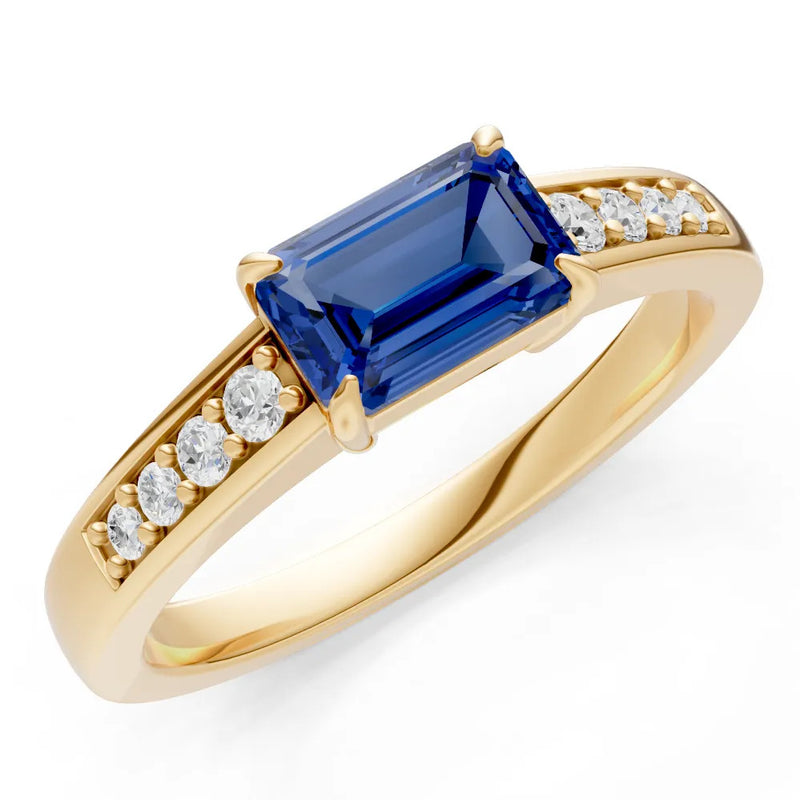 Blue Sapphire East West Emerald Cut Gemstone Ring with Accents