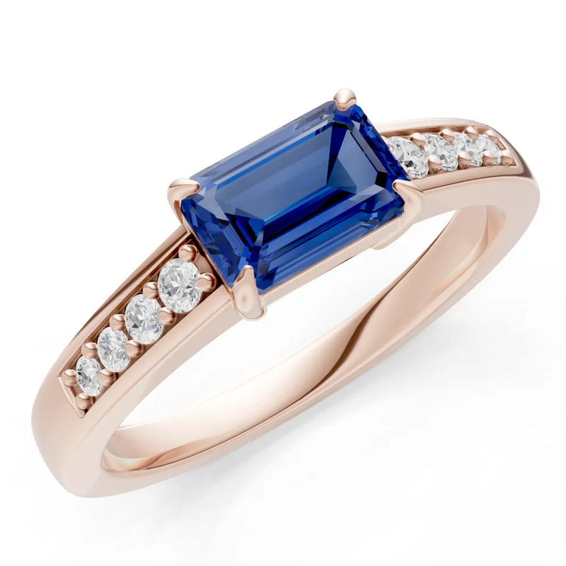 Blue Sapphire East West Emerald Cut Gemstone Ring with Accents