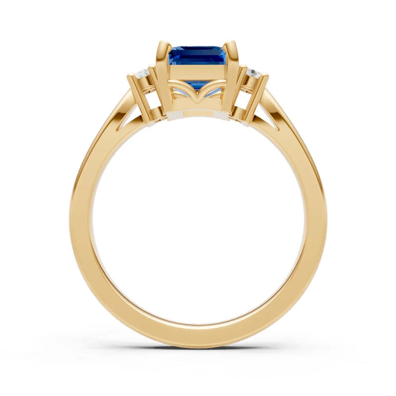 London Blue Topaz Three Stone Emerald Cut Engagement Ring With Accent