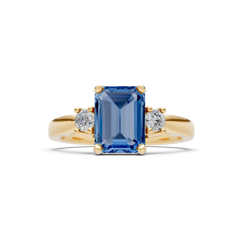 London Blue Topaz Three Stone Emerald Cut Engagement Ring With Accent