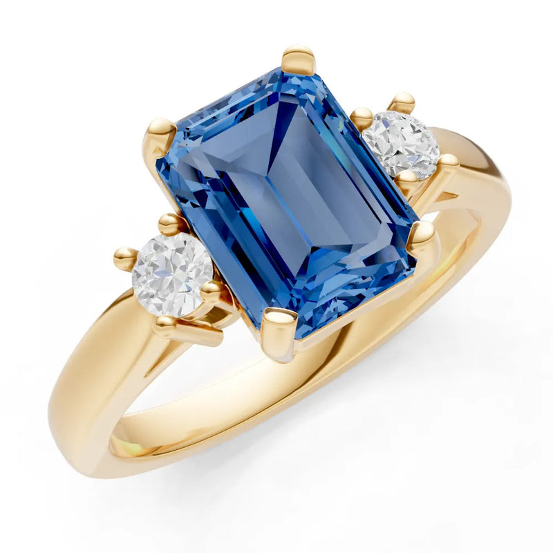 London Blue Topaz Three Stone Emerald Cut Engagement Ring With Accent