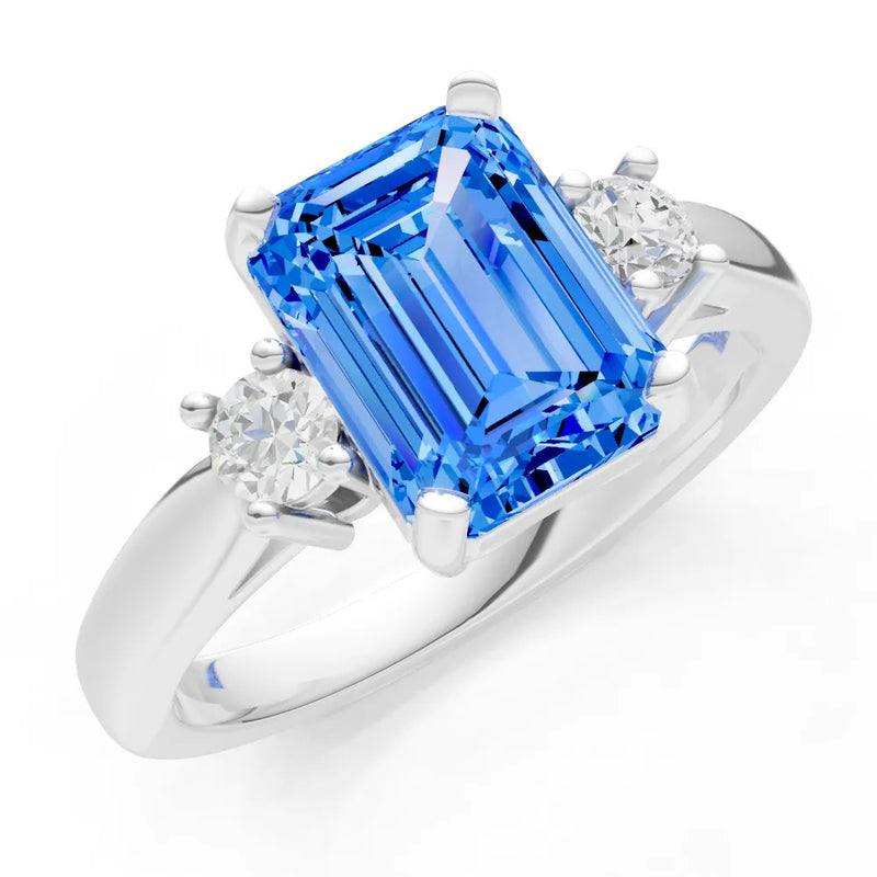 Swiss Blue Topaz Three Stone Emerald Cut Engagement Ring With Accent