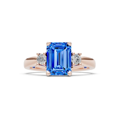 Swiss Blue Topaz Three Stone Emerald Cut Engagement Ring With Accent
