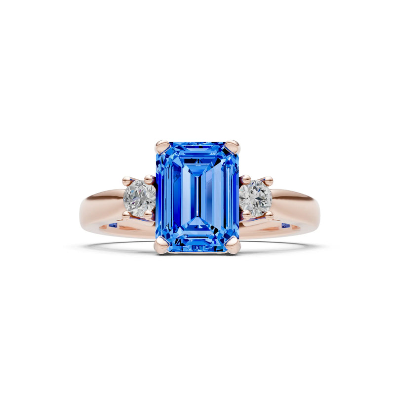 Swiss Blue Topaz Three Stone Emerald Cut Engagement Ring With Accent