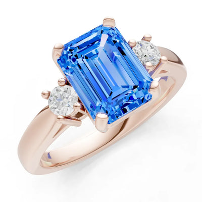 Swiss Blue Topaz Three Stone Emerald Cut Engagement Ring With Accent