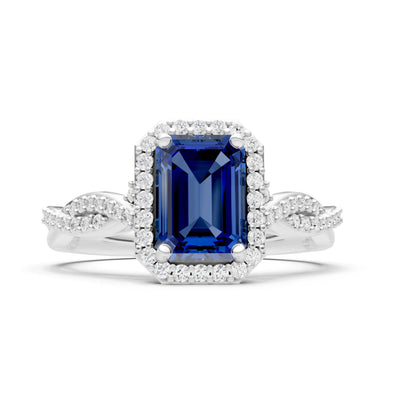 Blue Sapphire Twisted Vine Solitaire Emerald Cut Halo Ring with Accent