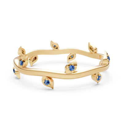 London Blue Topaz Dainty Leaf Motif Prong Eternity Band