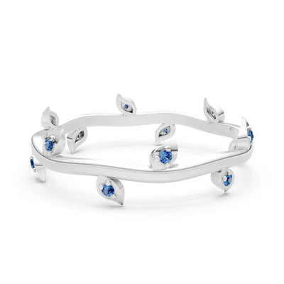 London Blue Topaz Dainty Leaf Motif Prong Eternity Band