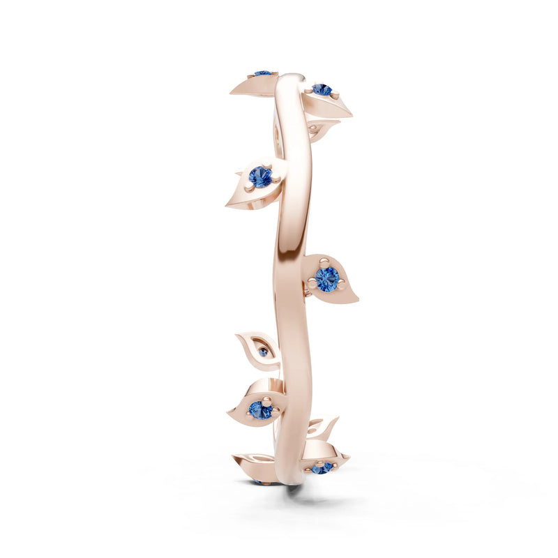 London Blue Topaz Dainty Leaf Motif Prong Eternity Band