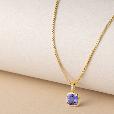 genuine tanzanite 14k yellow gold pendant with diamonds