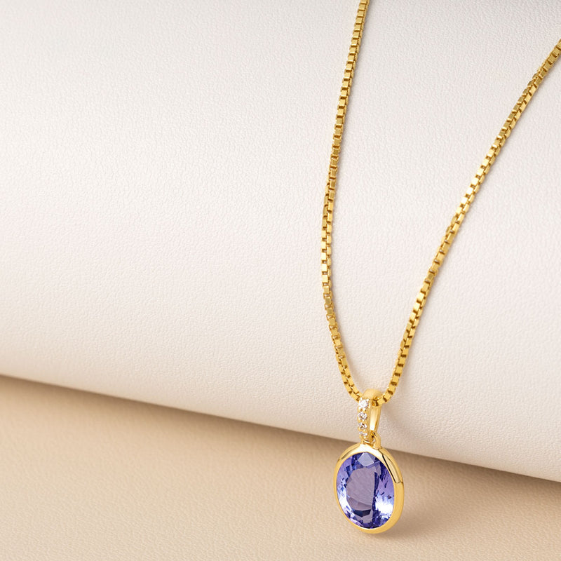 genuine tanzanite 14k yellow gold pendant with diamonds