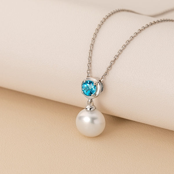 pearl and swiss blue topaz gemstone pendant in sterling silver