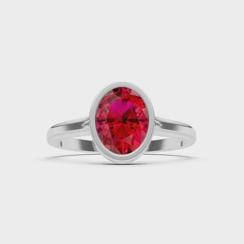 Ruby Oval Shape Bezel Set Solitaire Ring