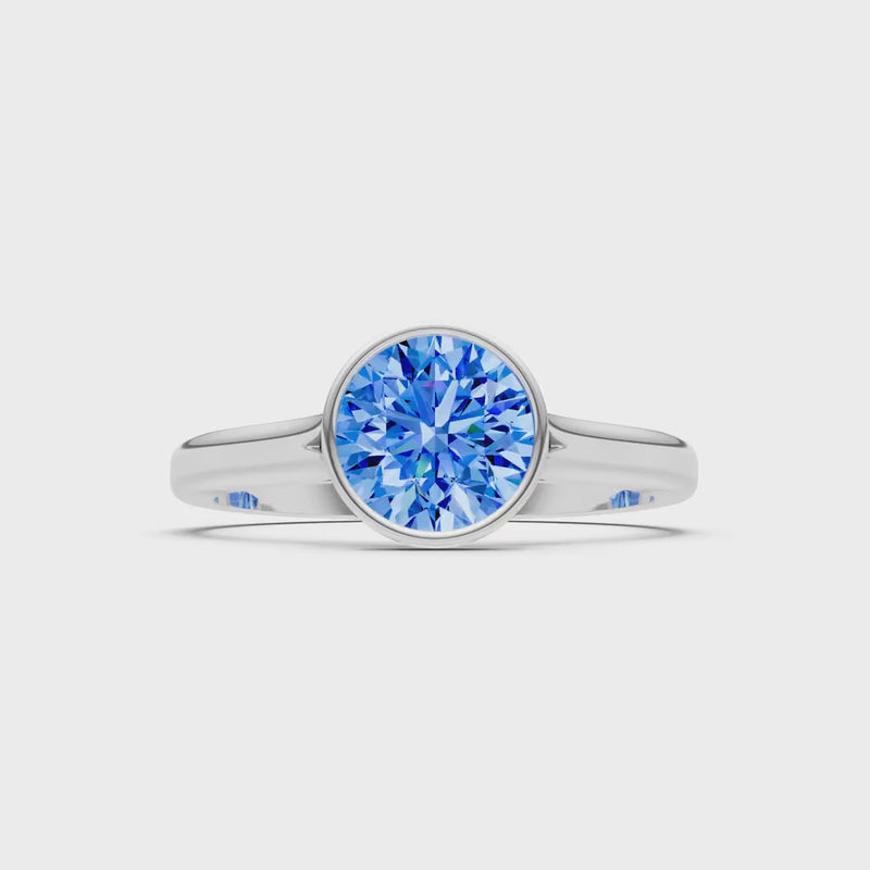 Swiss Blue Topaz Round 6.5mm Normal Round Bezel Set Solitaire Ring