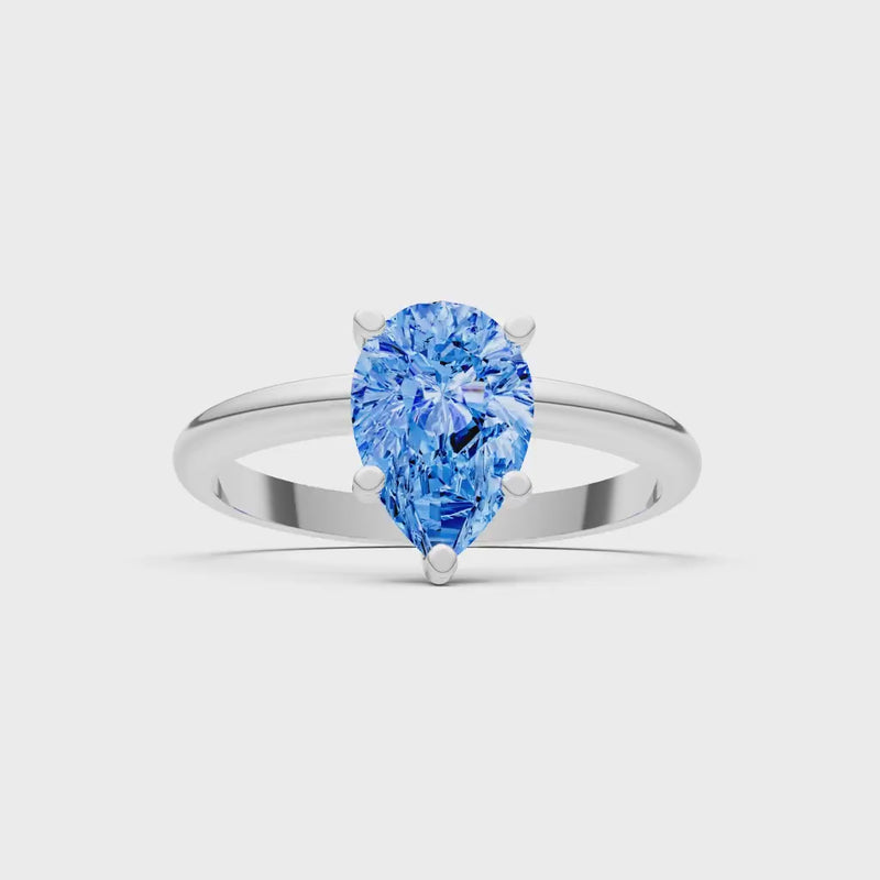 Swiss Blue Topaz 5 Prong Pear Shape Solitaire Engagement Ring