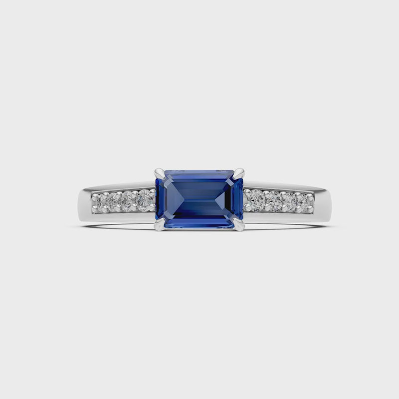 Blue Sapphire East West Emerald Cut Gemstone Ring with Accents