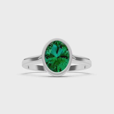 Emerald Oval Shape Bezel Set Solitaire Ring