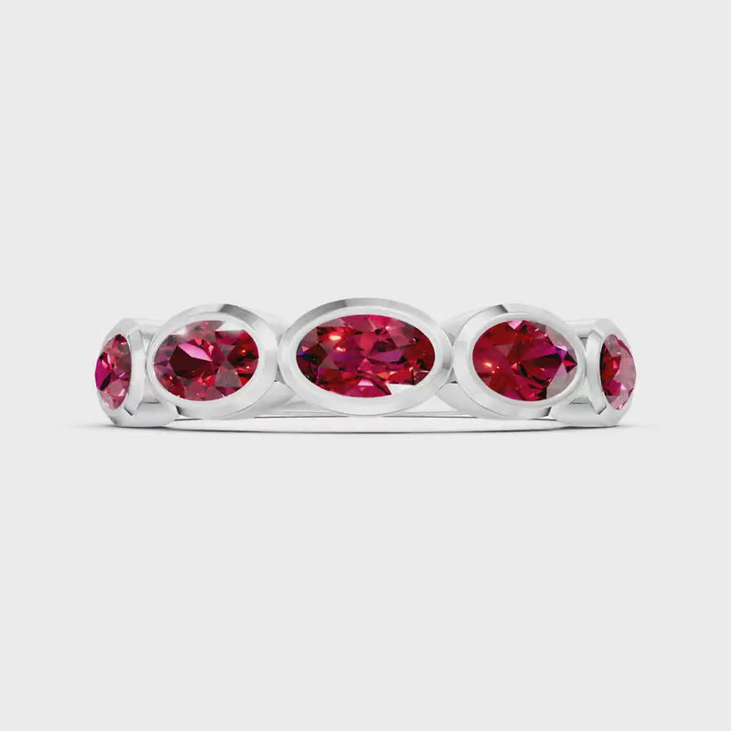 Ruby Bezel Set Oval Cut Half Eternity Band