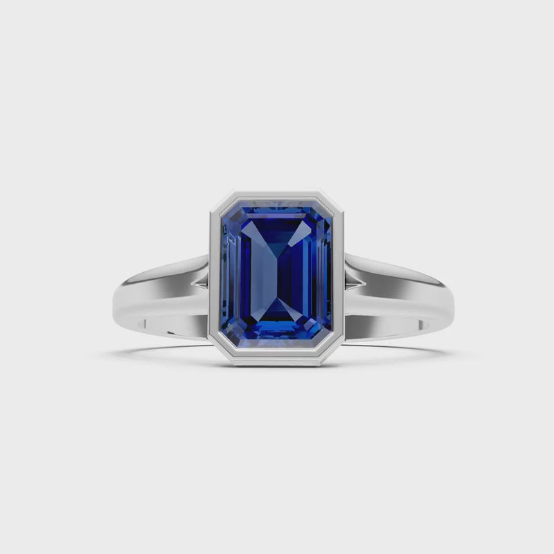 Blue Sapphire Emerald Cut Bezel Set Solitaire Ring