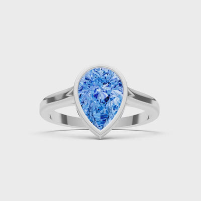 Swiss Blue Topaz Pear Shape Bezel Set Solitaire Ring